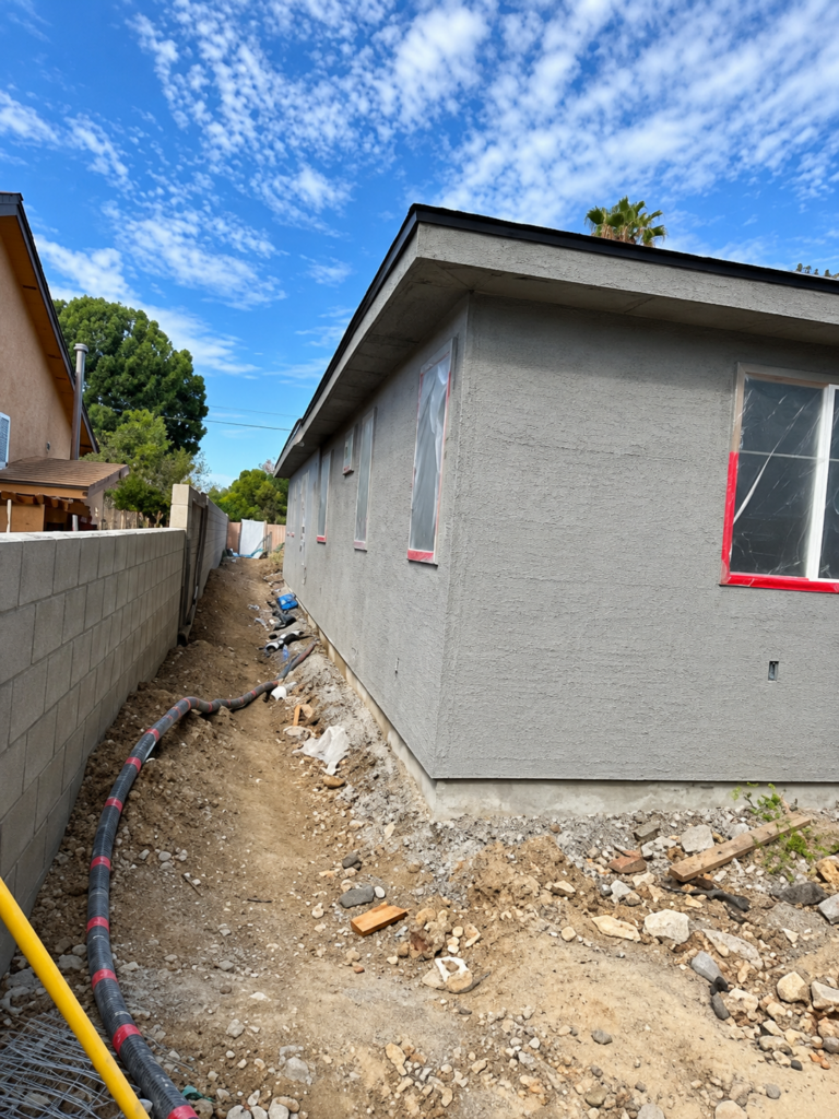 Fresh stucco applied to a residential exterior