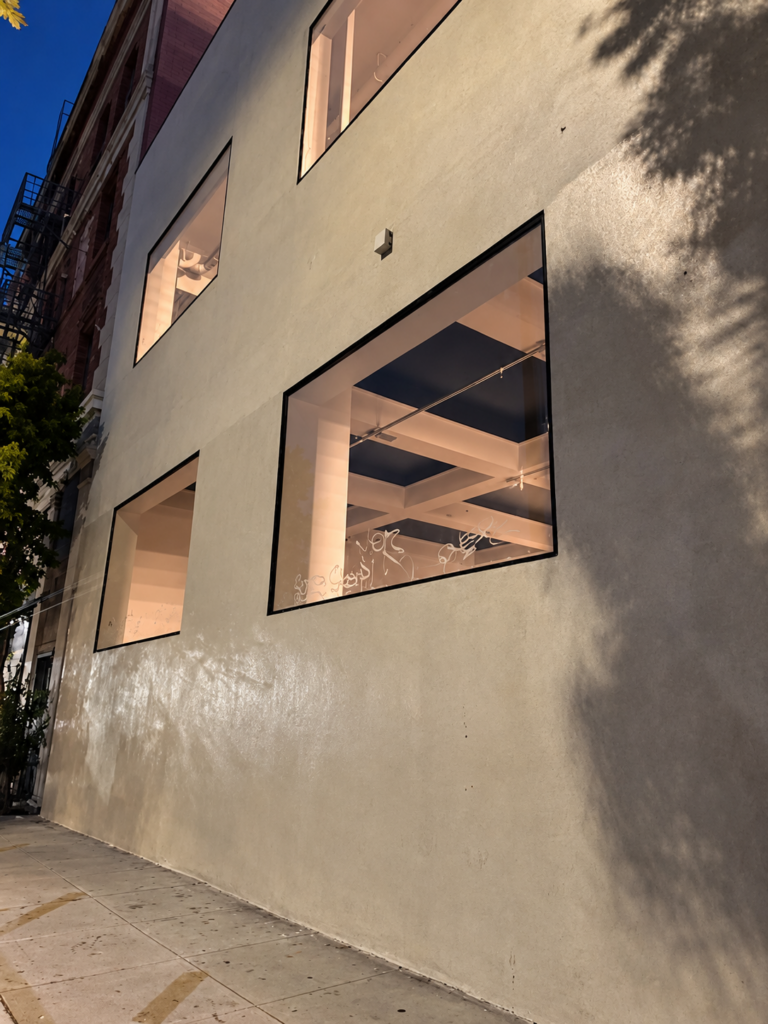 Textured stucco exterior with clean window detailing